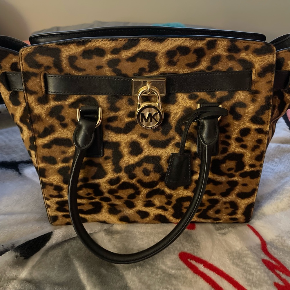Michael Kors leopard print, cow fur purse. Mint condition
